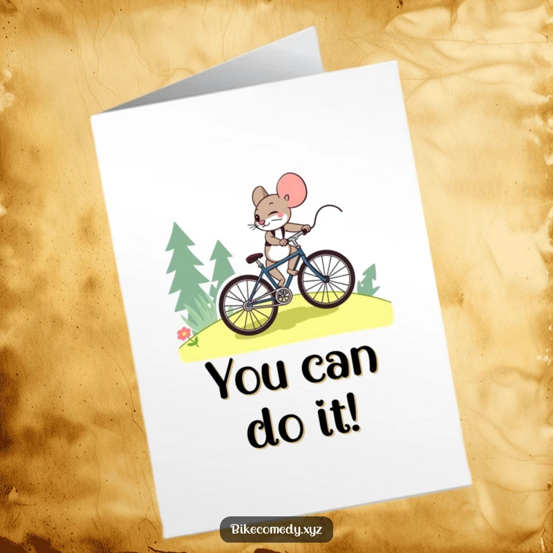 Funny Free Printable Birthday Card: A determined mouse pedals a bike uphill, conquering challenges with birthday spirit.