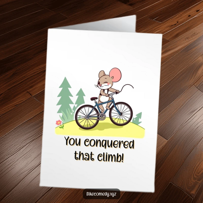 Funny Free Printable Congrats Card: A brave mouse powers a bicycle uphill, celebrating your well-earned success.